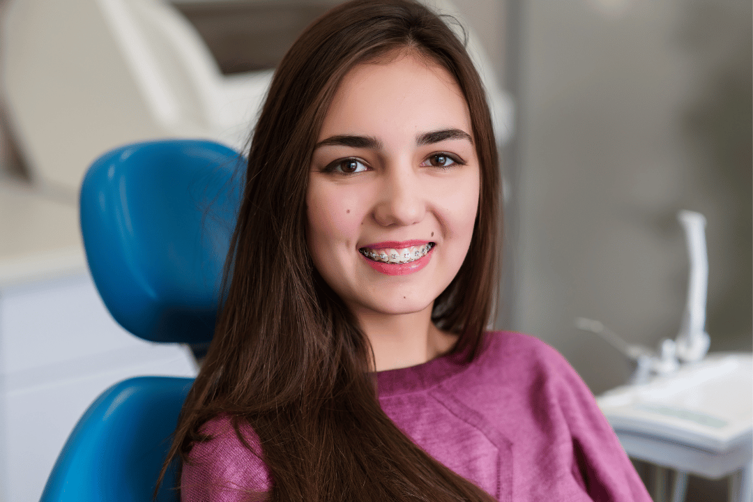 smiling patient with braces brooklyn