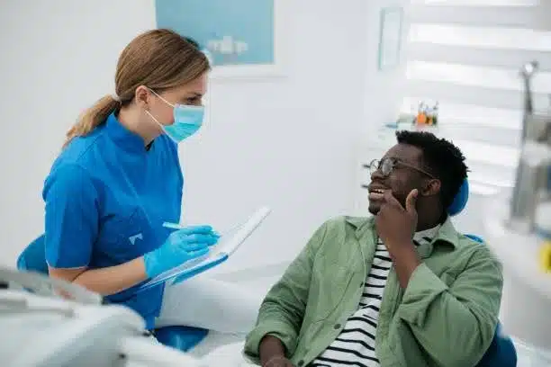 dentist-Bedford-Stuyvesant-ny-consultation Patient during consultation with dentist near Bedford-Stuyvesant, NY
