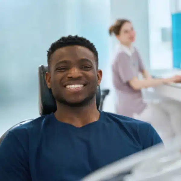 dental-care-clinton-hill-ny-smile-result Smiling patient after cosmetic and restorative dental treatment