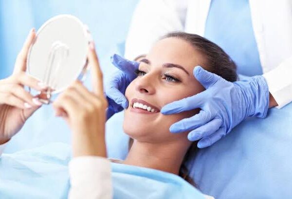 root-canal-treatment-result Patient smiling after successful root canal treatment